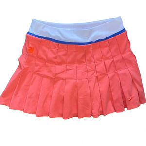 NIKE Fit Dry Pleated Tennis Skort Size XS Salmon Coral Pink Golf Athletic Spring